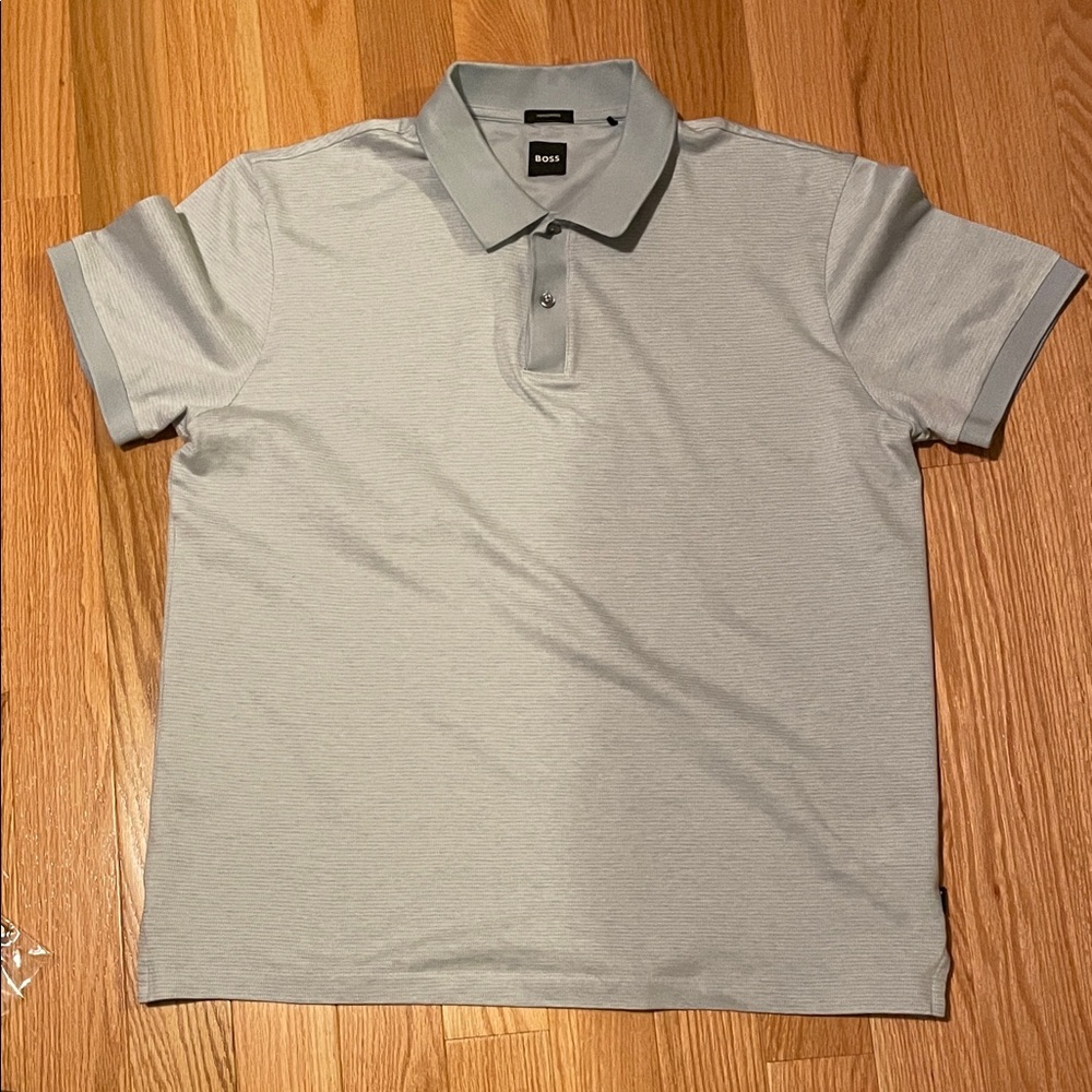 Boss Men's Light Blue   Polo Shirt
Purchased in Paris.